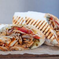 Israeli Chicken Shawarma
Sandwich · Delicious sandwich made with grilled Chicken Shawarma, fried eggplant, vegetables, hummus, T...