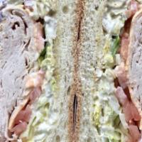 Boar’S Head® Ovengold® Turkey Sandwich · On a roll, sliced bread, bagel, or wrap with cheese, lettuce, tomato and mayo.