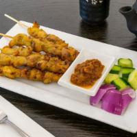 Satay Chicken Or Beef (5 Sticks) · Spicy. Marinated beef or chicken on skewers, charcoal grilled to perfection. Served with pea...