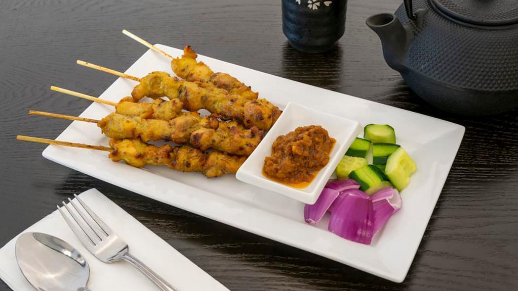 Satay Chicken Or Beef (5 Sticks) · Spicy. Marinated beef or chicken on skewers, charcoal grilled to perfection. Served with peanut sauce.