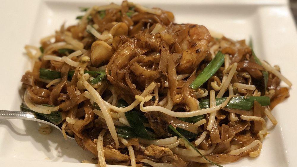 Char Kway Teow · Spicy. Popular stir fried flat rice noodles with fresh shrimp, squid, bean sprouts, eggs, soy sauce and chili paste.
