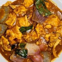 Red Curry Chicken · Spicy. White meat chicken cooked with curry leaves in coconut milk curry.