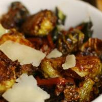Bacon Fried Brussel Sprouts · Ginger, garlic, balsamic soy, kimchi, carrots, shaved parmesan.