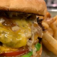 Boom Burger · Special sauce, caramelized onion, american cheese, tomato, sliced pickle, lettuce, onion, se...