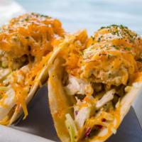 Fish Taco · fried catfish. TCB coleslaw, remoulade, sweet aioli, cheddar cheese, parsley