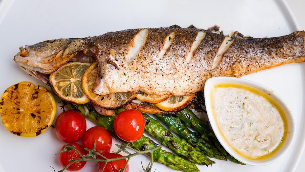 Branzino · grilled whole fish. mashed potato, choice of grilled asparagus or steamed broccoli. lemon garlic butter