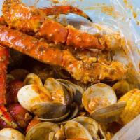 King Crab Combo · 1 lb of Alaskan king crab with choice of 1 lb of Crawfish, Green Mussels, Black Mussels, Cla...