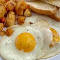 Breakfast Platter  · Two eggs any style served with home fries and toast.