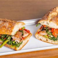 Roast Pork  · Broccoli Rabe, Provolone, Pickled Peppers, Spicy Honey on a seeded Roll