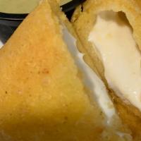 Cheese Empanada · Queso blanco (white cheese), mozzarella cheese or Cheddar cheese, all prepared fresh. Empana...