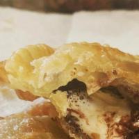 Double Chocolate Chip Marshmallow Empanada · Exactly what is sounds like, homemade double chocolate chip cookie and marshmallow in a empa...