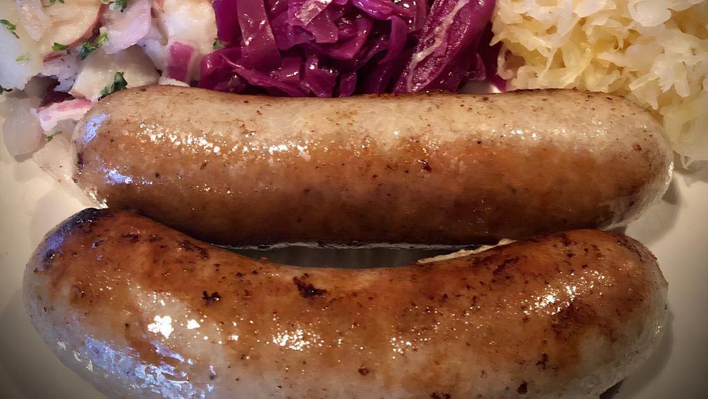 Bratwurst · Classic Wurst, Pan Fried, Served with Potato Salad, Sauerkraut, Red Cabbage. Bettola Mustard