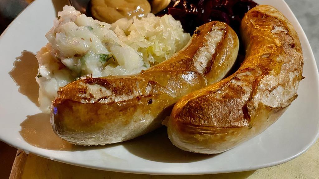 Weisswurst · The most popular Wurst in Germany, Potato Salad, Sauerkraut,, Red Cabbage, Bettola Mustard