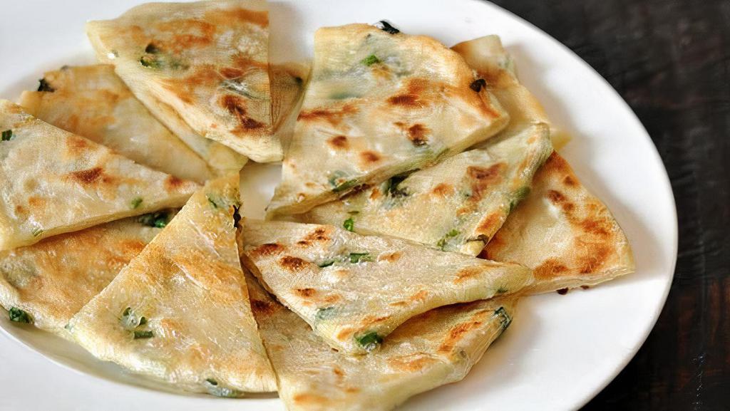 Scallion Pancake · Savory folded flatbread.