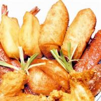 Pu Pu Platter (For 2) · chicken wings, bbq ribs, pork eggroll, fried shrimp, fried wonton,  shrimp toast, teriyaki b...