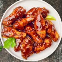 Bbq Bliss Chicken Wings · Fresh chicken wings breaded, fried until golden brown, and tossed in barbecue sauce. Served ...