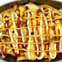 Signature Fries · Ketchup, mayo, mustard, pickles and cheese sauce