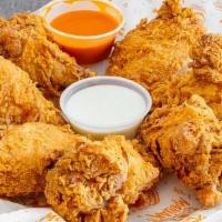 10 Breaded Wings · Made to order freshly breaded and fried Bone-in wings served with choice of dust and dipping...