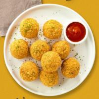 Mac & Cheese Balls · (Vegetarian) Bite-size clumps of mac and cheese breaded and fried until golden brown. (10 pi...