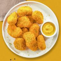 Corn Nuggets · Bite sized nuggets of corn breaded and fried until golden brown. (10 pieces)