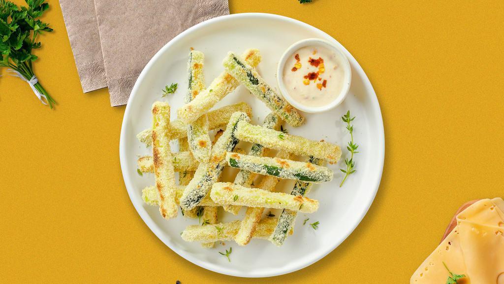 Zucchini Fries · (Vegetarian) Sliced zucchini breaded and fried until golden brown. (10 pieces)