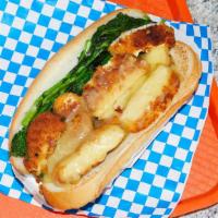 Italian Chicken Sandwich · Breaded chicken cutlet, provolone cheese, broccoli rabe, hoagie roll.