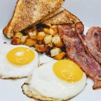 The Classic · Two eggs with seasoned home fries and toast. Add ham, two sausage or three bacon for an addi...
