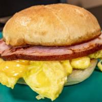 Egg Sami · Two eggs with American cheese and choice of ham, bacon, or sausage, served on fresh Costanzo...