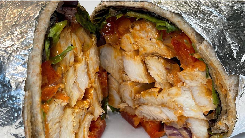 Buffalo Chicken Shack Wrap · Grilled Buffalo chicken, mixed greens, tomato and crumbled blue cheese with blue cheese dressing. With chips