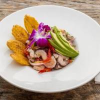 Ceviche Mixto · Made fresh daily. Squid and shrimps, sliced mango green peppers, red peppers, red onion, cil...