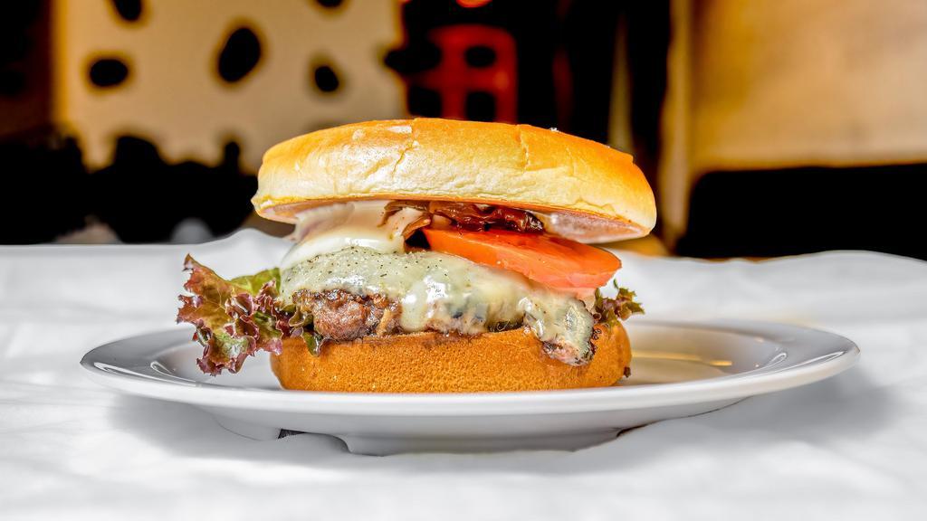 Truffle-Upagus · Incredible Wagyu beef infused with black truffles! Burger is topped with roasted garlic mayo, lettuce, tomato, grilled onions and Gruyere cheese. Served on a toasted brioche bun.