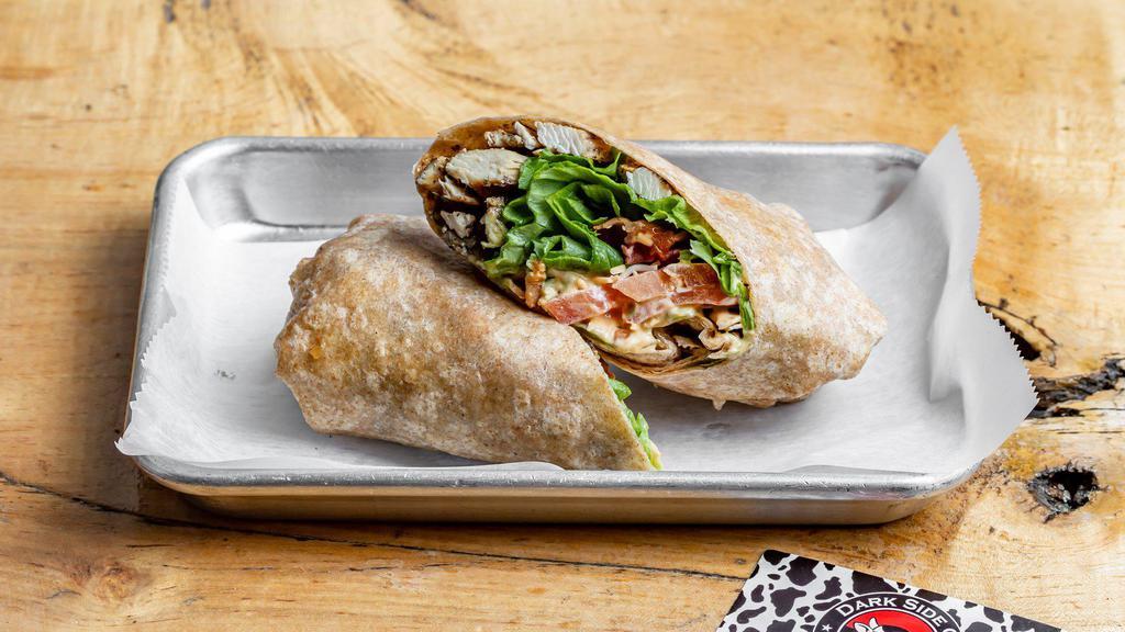 Chicken Royale Wrap · Breaded or grilled chicken, lettuce, tomato, shredded cheddar/Monterey jack cheeses, bacon, guacamole, and Moo special sauce. White flour or whole wheat wrap