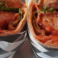 Buffalo Chicken Wrap · Breaded chicken tenders dipped in our house buffalo sauce. Served with lettuce and your choi...
