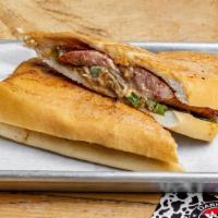 Smoked Alligator Sausage Sandwich · Cajun sausage from Louisiana. Made with alligator and served with chipotle mayo, grilled pep...
