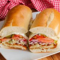 Chicken Club Hero Sandwich · Classic club with chicken, lettuce, tomato, and mayo in a fresh hero bun.