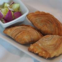 Curry Puffs* · Fried curry puff stuffed with potato, onion, carrot, curry powder, and served with cucumber ...