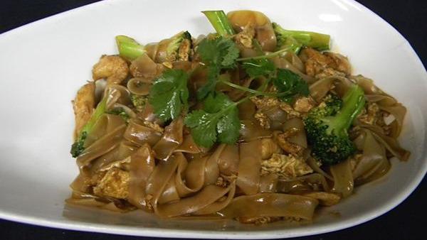 Pad See You · Thick rice noodles sauteed with Chinese broccoli, and soy sauce
