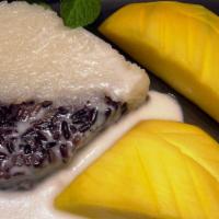 Sticky Rice With Mango · Gluten free. Vegan. Sticky rice with delicious mango served with coconut milk