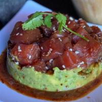 Tuna Guacamole Tartare · Tuna, guacamole and sesame seeds with a touch of soy sauce and tamarind