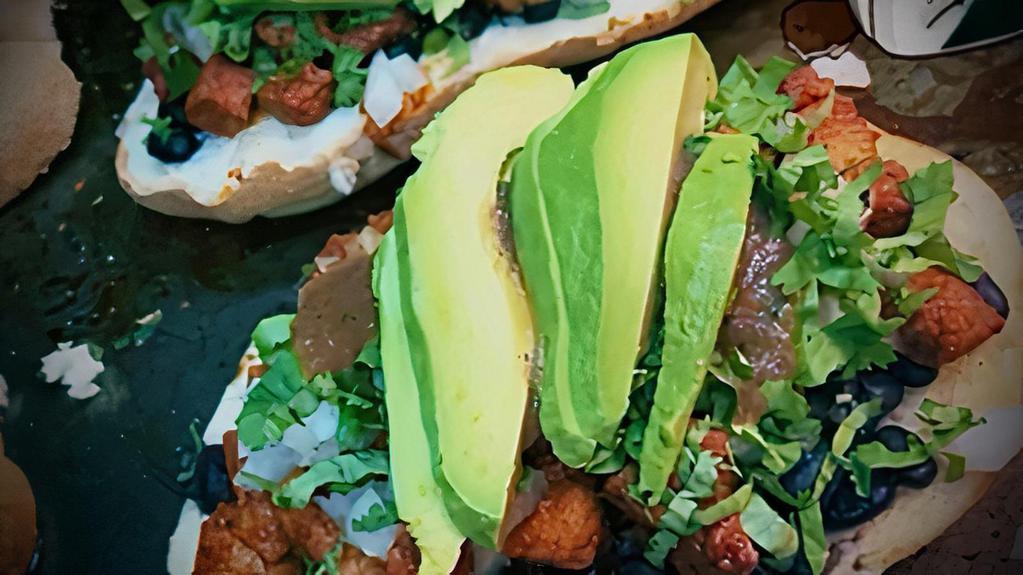 Del Sur Torta · Mexican bread with mayo, black beans. avocado, cilantro, onions, cheese & red salsa. Your choice of meat.