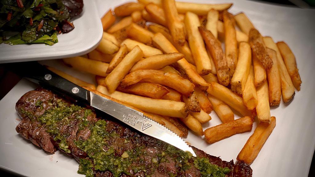 Skirt Steak · Grilled skirt steak with chimichurri sauce and seasoned french fries.
