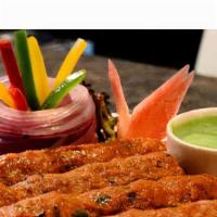 Sheek Kabab (Lamb) · Marinated ground lamb/ground chicken cooked in clay oven.