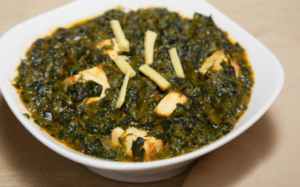Saag Panner · Fresh spinach cooked with Indian fried cheese.
