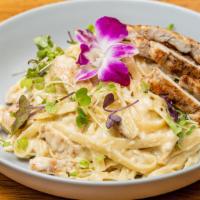 Houdou’S Alfredo Pasta · Al dente fettuccine pasta combined with grilled chicken and azara’s distinctly tasting homem...