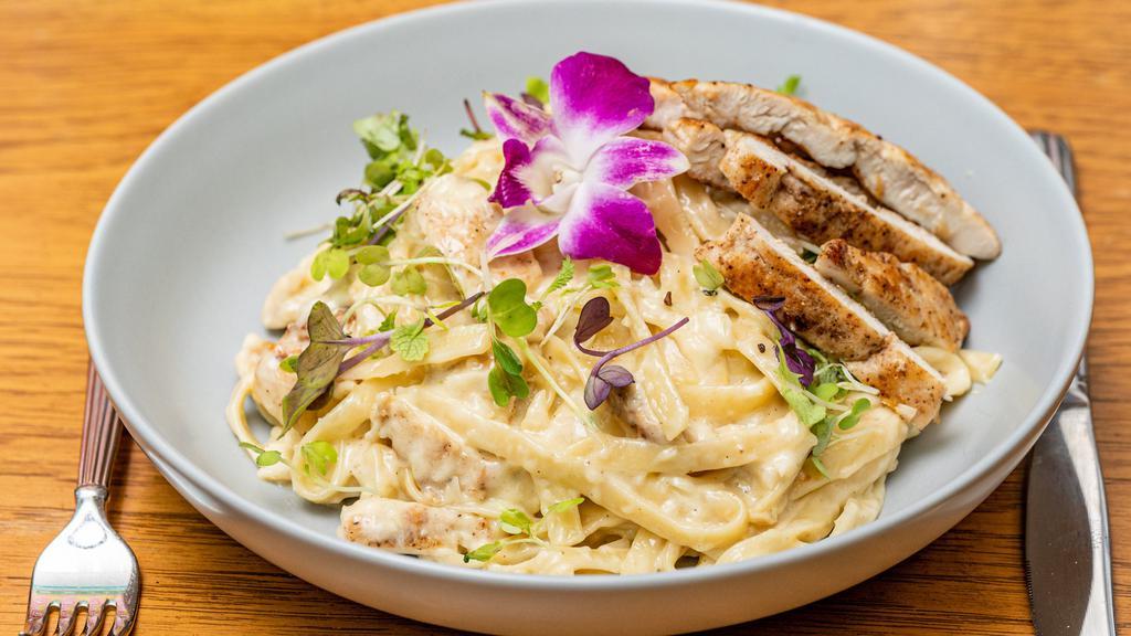 Houdou’S Alfredo Pasta · Al dente fettuccine pasta combined with grilled chicken and azara’s distinctly tasting homemade alfredo sauce.