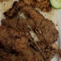 Mixed Grill · Lamb Chops and Chicken mix Served With Rice, salad, White Sauce And Mango Habanero.