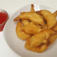Sweet & Sour Shrimp · Served with white rice and sauce on the side.