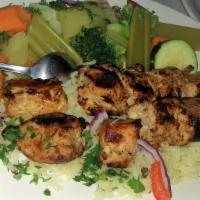 Chicken Kebob · Char grilled marinated chunks of boneless chicken breast served with house rice steamed fres...