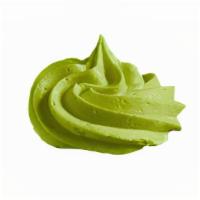 Matcha Whipped Cream · Homemade fluffy matcha whipped cream dip packed in plastic container for ugnuts.