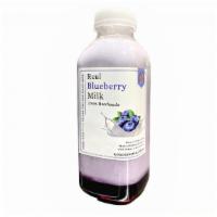 Real Blueberry Milk · Bottled blueberry milk made with homemade fresh blueberry syrup and whole milk